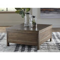 Signature Design by Ashley Moriville Brown Lift Top Cocktail Table - 36 W x 36 D x 18 H
